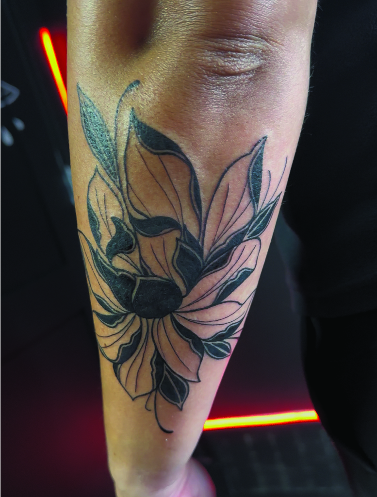 Picture of a japanese peony tattoo.