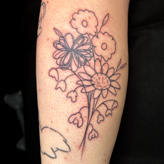 Linework flower bouquet tattoo